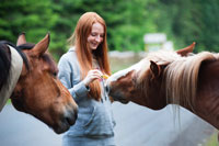 girl with two horses